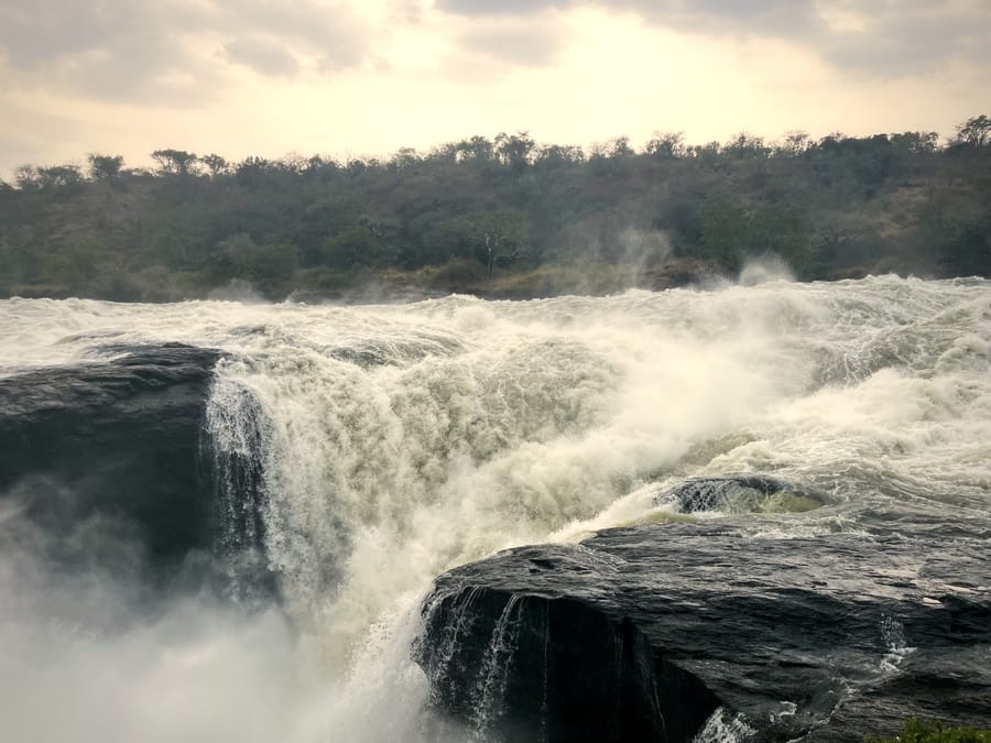 The lip of Murchison Falls — the whole river forced over a black rock ledge.